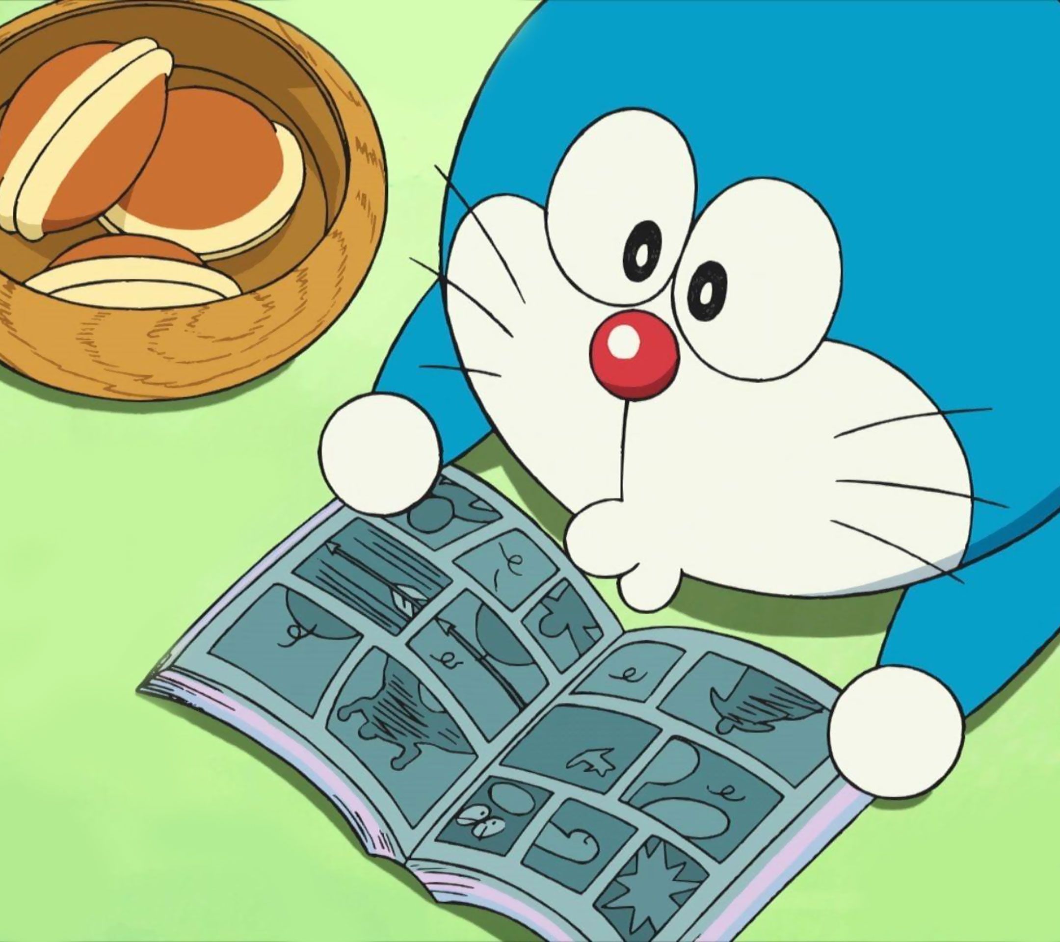 哆啦a梦机器猫悠闲看漫画吃零食手机壁纸图片