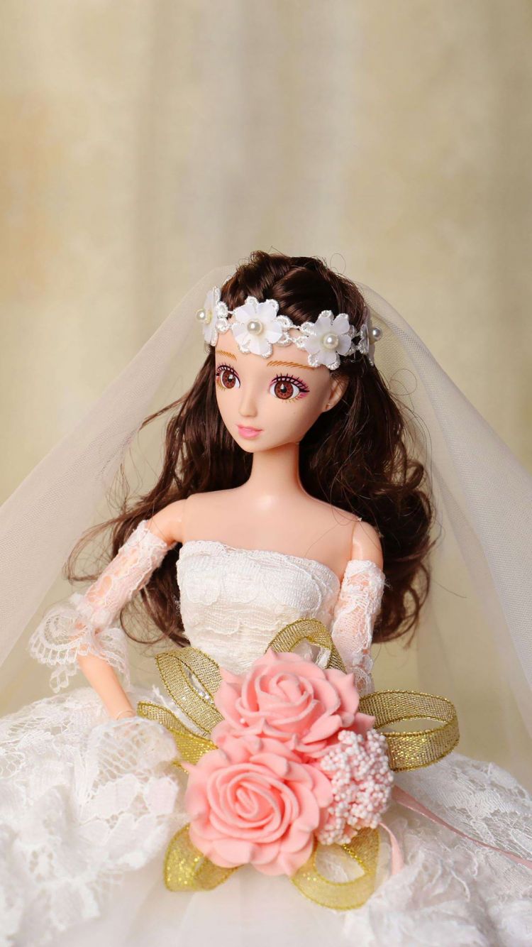 穿着婚纱的漂亮新娘,逼真的芭比娃娃玩具手机壁纸图片