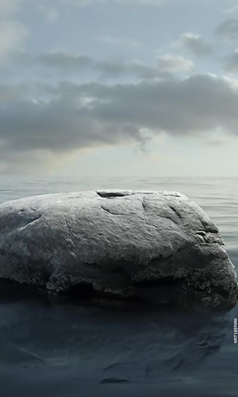 还算平静的海中,一块静静的大石头手机壁纸图片