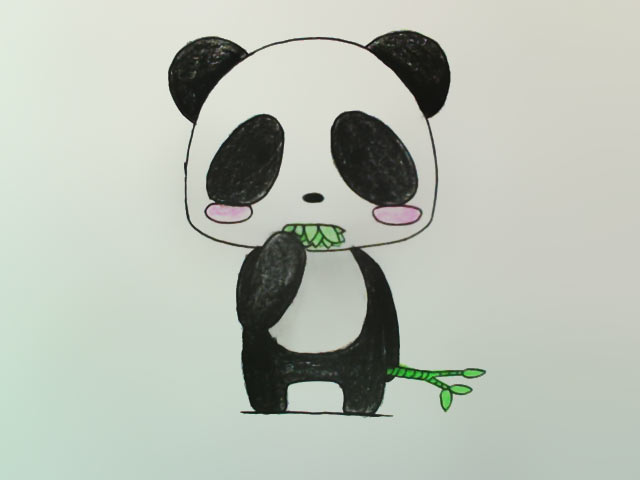 嘴里吃着竹叶的熊猫又萌又呆地看着你的图片手机壁纸