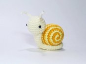 十分可爱，用毛线编织成的蜗牛手机图片