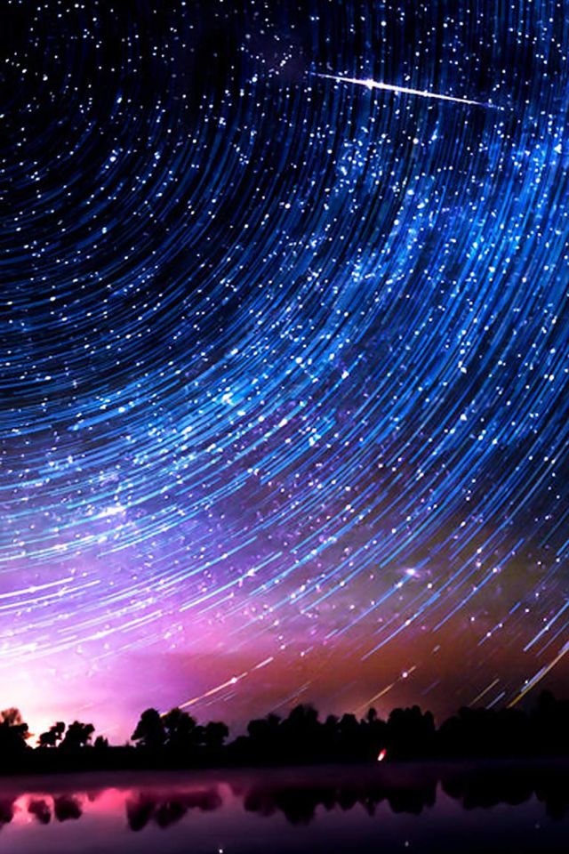 延时摄影旋转的星空和明亮的流星雨炫丽手机图片壁纸